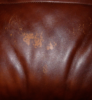 Tu-Tone Leather Damage Before